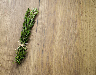 Rosemary on a wooden background