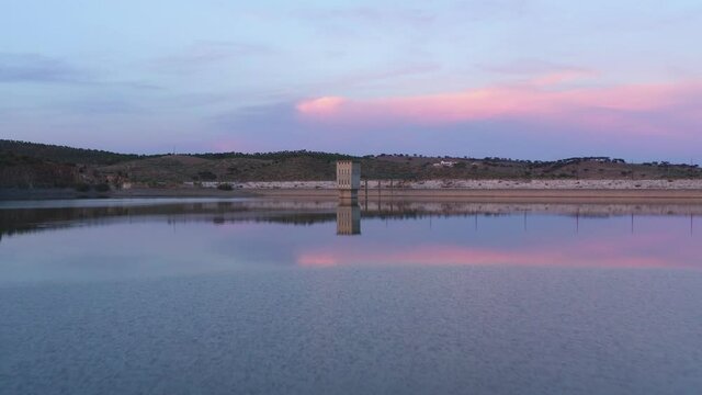 Drone aerial view of a dam lake reservoir landscape in Terena, Portugal