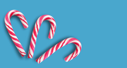Christmas candy on a colored background