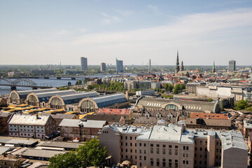 Panoramic top view of Riga, during sunny day, with visible Market buildings
