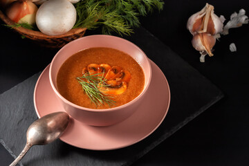 Fresh mushroom puree soup with vegetables, dill and toast