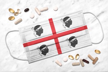 Face mask with flag of Sardinia during coronavirus pandemic