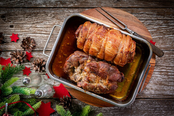 Baked bacon roulade and roasted pork neck.