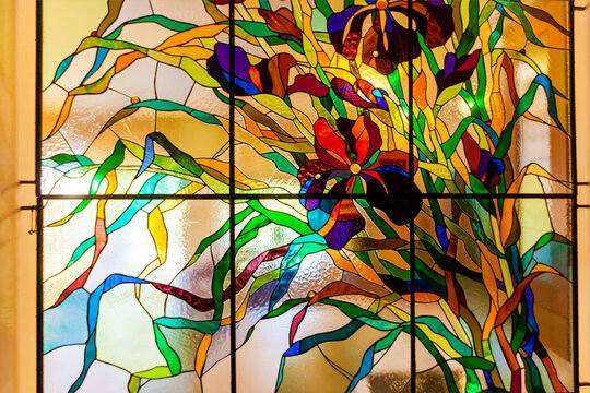 Stained glass with multicolored flower