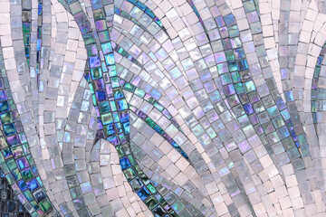 Ceramic mosaic tiles with mother-of-pearl squares laid out randomly.