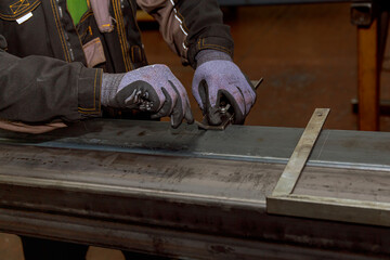 markings on a metal surface for drilling holes. Marking tools.