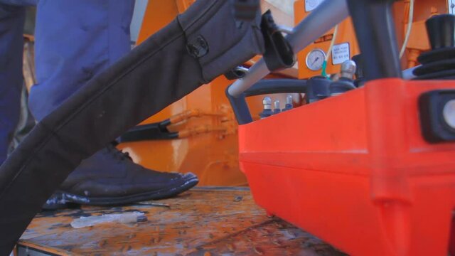 Concrete Pump Remote Control Close-Up &ndash; Monolithic Construction Industry

Detailed close-up of a concrete pump remote control used in monolithic construction. 