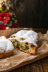 Christmas Stollen on a wooden table.