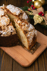 Panettone holiday cake on a wooden background
