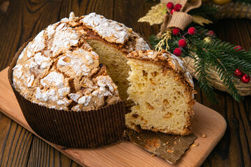 Fototapeta na wymiar Panettone holiday cake on a wooden background 