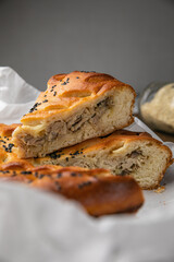 Meat pie on a brown wooden table
