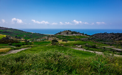 Water meadows and hills on the Mediterranean coast on the island of Cyprus.