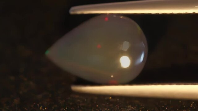 natural rainbow opal on the background