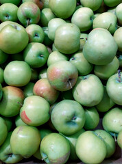 Boxes with fresh apples in the supermarket