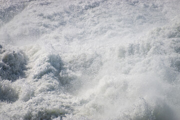 Naklejka na ściany i meble Crashing waves at coast of Indian Ocean, Plettenberg Bay, South Africa.