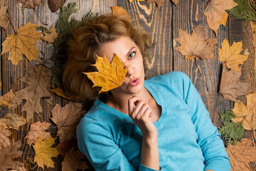 Carefree and happy. woman hold maple leaf. canada. girl relax on autumn background. Beauty in autumn style. Sharing love to nature. Staying beautiful any season. autumn female fashion
