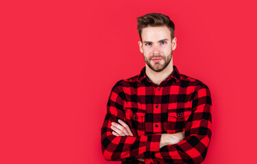 Handsome cowboy. unshaven guy in casual style. male hairdresser and barbershop. male beauty trend. bearded man with sexy bristle. facial hair skin care. handsome man wear checkered shirt. copy space