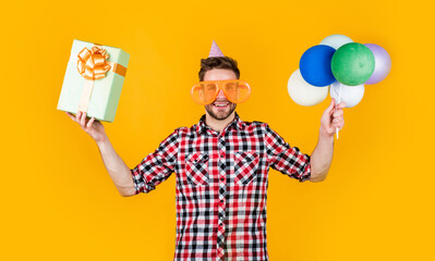 Responsible shopping. he is life of the party. leisure on happy weekend. excited handsome guy in glasses having fun. fashion look. enjoying party celebration. expressing positivity. funny bachelor