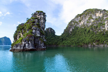 Rocks green trees Ha Long Bay, Vietnam