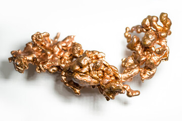 Close-up view of a native copper resemble like a dragon isolated on the white background.