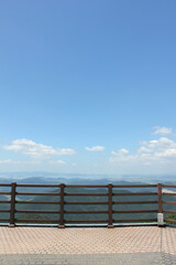 Fototapeta premium Blue sky landscape and observation platform railing
