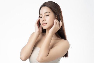 Beautiful Young asian Woman with Clean Fresh Skin, on Pink background, Face care, Facial treatment. Cosmetology, beauty and spa. Asian women portrait