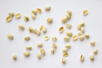 Pistachios isolated on white background, top view. 