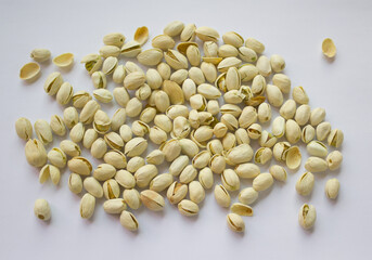 Pistachios isolated on white background, top view. 