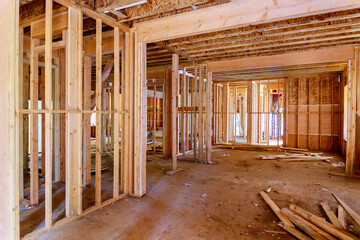 Fototapeta premium New residential home framing interior view construction new house