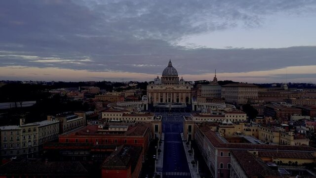 Aerial drone view, San Pietro Basilica, shot with drone along Via della Conciliazione  - Vatican City