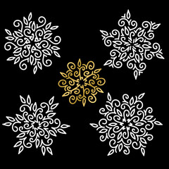 White and gold snowflakes set on black background. Vector illustration.