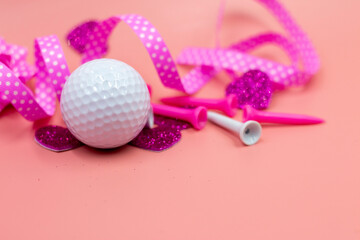 Golf ball with pink ribbon for Party on Pink Background