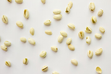 Pistachios isolated on white background, top view. 