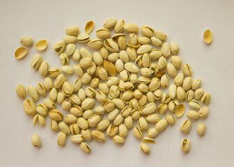 Pistachios isolated on white background, top view. 
