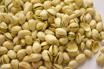 close up Pile of Pistachios isolated on white background.