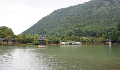 Fototapeta na wymiar landscape of black dragon pool park in Li jiang city, yunnan , china