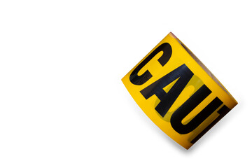 Roll of industry yellow caution tape isolated white background  