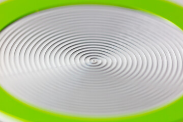 The bottom of a metal frying pan as an abstract background.