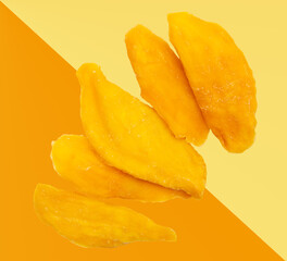 Dried mango isolated on yellow background.
