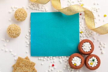 Indian festival makar sankranti concept : Tilgul and sesame seed ball or ladoo with copy space