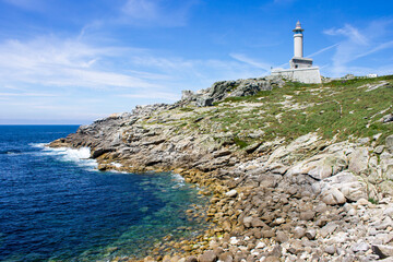 Fototapeta na wymiar Malpica, Spain. The lighthouse at Punta Nariga, a scenic headland in the Costa da Morte (Death Coast) in Galicia