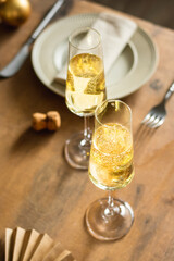 Celebrations with champagne, two glasses on the table