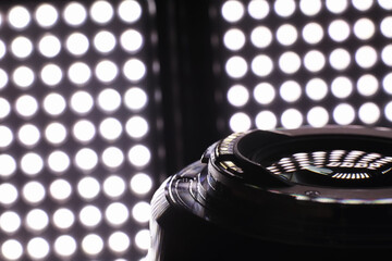 Equipment videographer and photographer. Lenses on the table against the background of bright...