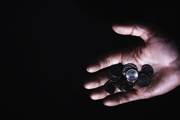 Volatility of the national currency. Russian coins with the inscription "ruble". Low ruble exchange rate. Fall of course. Financial crisis. Ruble in the hand.