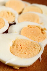 Fototapeta na wymiar Sliced hard boiled eggs