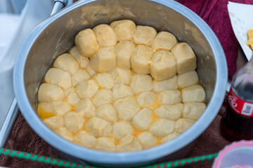 The ingredients of Roti Making, white raw Roti thresh flour by maker. Indian traditional street food. Cooking roti or Indian food made of flour.Thailand street food. The dough is placed in a beautiful