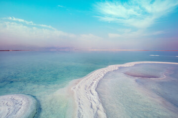 Fototapeta na wymiar The texture of the Dead Sea. Salty seashore. Israel