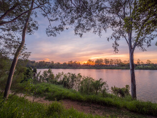 Beautiful Riverside Sunset with Reflections