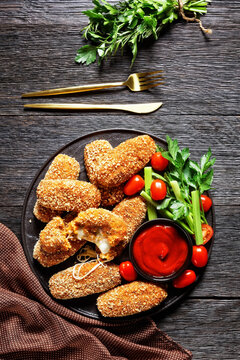 Suppli Al Telefono On A Black Plate, Top View