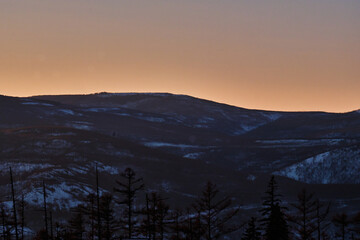 Sunset among the mountains on the road Lidoga-Vanino Khabarovsk territory.